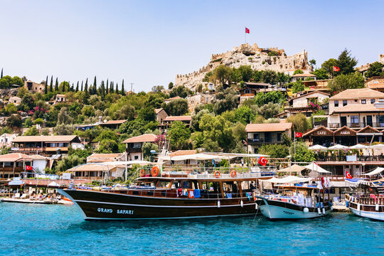 Seaside village near Kekova Island and Simena fortress, Turkey, with vivid blue waters and rustic charm. Popular tourist destination for boat tour. Aug. 01, 2018. Demre, Antalya, Turkey (Turkiye)
