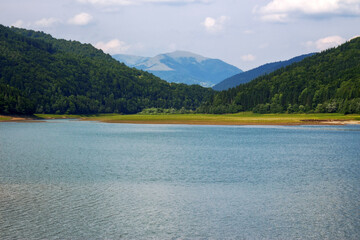 water reserve in mountainous landscape of transcarpathia. early summer nature scenery on a cloudy day