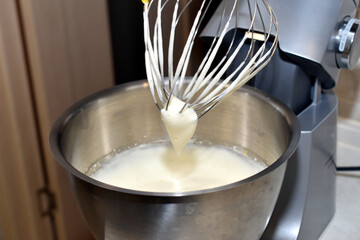 Fototapeta na wymiar Kitchen mixer after whipping cream.