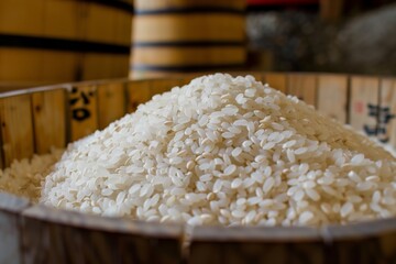 pile of white sushi rice in a wooden tub