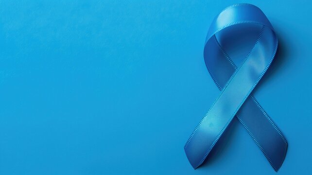 A blue awareness ribbon on a background, symbolizing various social issues.