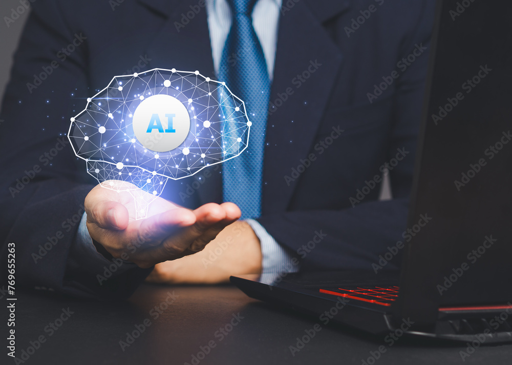 Poster businessman hand displays a brain symbol with artificial intelligence or an ai icon on a virtual scr