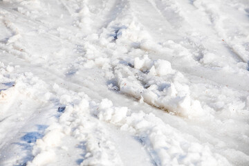 Fototapeta na wymiar abstract background wet snow on the ski slope