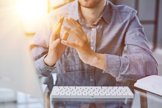 Call center, manager and telemarketing team at computer for software training