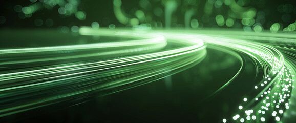 High-speed green neon light trails curve gracefully with a bokeh effect on a dark background