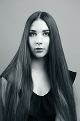 young woman with long straight dark hair