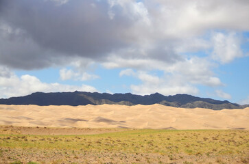 Fototapeta premium Erdene Grasslands and dunes on Gobi Desert, Mongolia