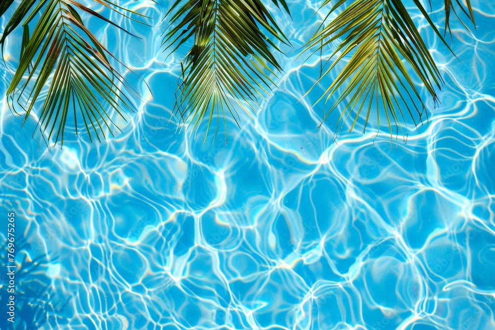 Poster serene pool with shimmering blue water reflecting palm trees under a clear sky on a sunny day