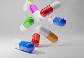 CAPSULES COMPRIMÉS COULEURS tombent sur le sol