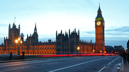 Fototapeta na wymiar Big Ben and Houses of Parliament With Light Trails Over Westminster Bridge London Night