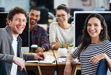 Happy, teamwork and portrait in office at computer for planning collaboration with notes or research. Staff, cooperation and employees coworking on creative project with excited energy for work
