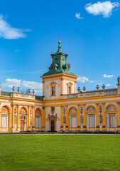 Warszawa, Poland - April 18: Focus on View of the central facade of the Royal Wilanow Palace. Spring in the park
