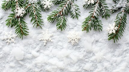 Christmas frame with spruce branch, snowflakes on snowy background, space for text placement