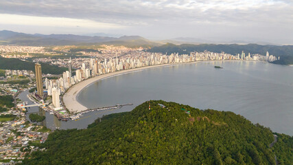 Fototapeta premium Balneario Camboriu in Santa Catarina. Taquaras Beach and Laranjeiras Beach in Balneario Camboriu. Aerial view in landscape.