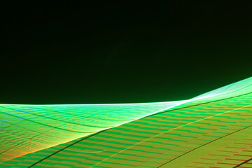 Large display featuring a pattern of green lights radiating outward along distinct lines
