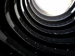 Interior view of a cylindrical round parking garage against the sky. Hamburg, Germany.