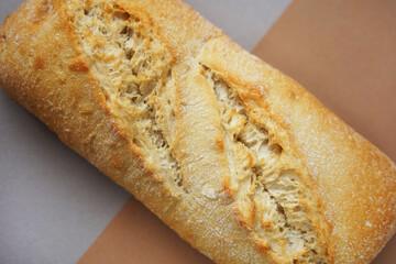 Wheat ciabatta on brown-gray background