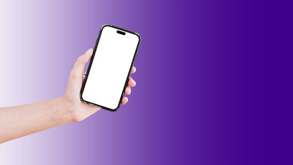 Close-up of hand holding smartphone with blank on screen isolated on background of violet.