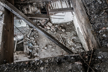 Capture the poignant aftermath of the war with this photo showcasing destroyed old houses in a...