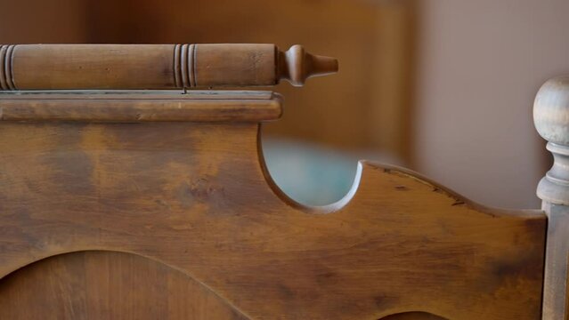 Close-up image showcasing the detailed craftsmanship of a vintage wooden rifle stock in Estonia