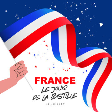 Human hand is holding a French flag. Bastille Day on July 14 - inscription in French. National holiday in France.