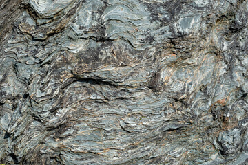 Fondo de piedra marina con colores verdosos y celestes. Roca de la Patagonia. Geología