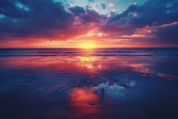 Papier Peint photo Réflexion The sun is setting over the beach, casting vibrant hues across the sky and reflecting off the calm ocean waters