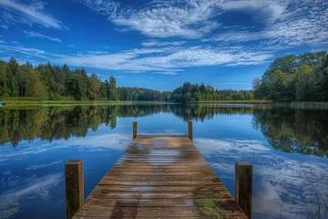 Gordijnen Serene Summer Landscape: Wooden Dock and Blue Reflections in Nature's Wonder © Web