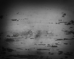 Abstract scratchy grunge gritty surface texture backdrop overlay in muted grey tones