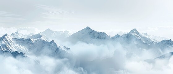 Fototapeta na wymiar panorama view of cold snowy mountains ranges peaks at altitude landscape covered with clouds at daytime