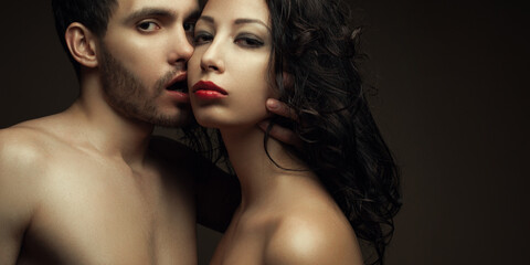 Aroma of pure passion concept. Emotive portrait of two lovers over chocolate background - handsome...