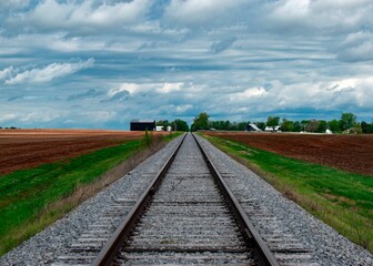 Fototapeta premium Scenic view of railroad tracks in a field in Kentucky