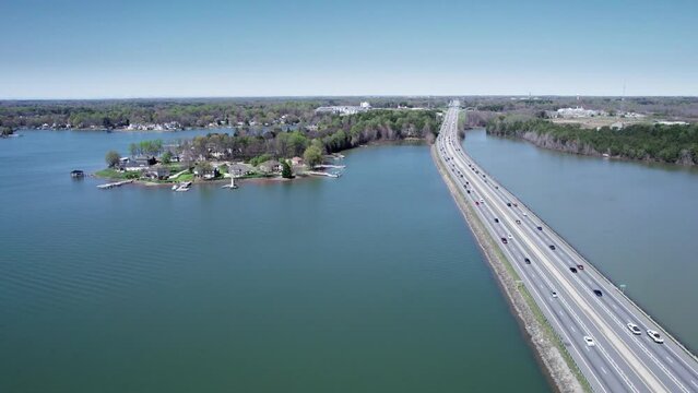 Motor boat heads in to port on Lake Norman in Davidson, NC