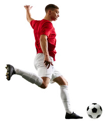 Triumphant kick towards victory. Professional football player sends ball into goal against...