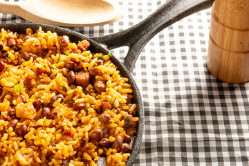 Baião de Dois traditional Brazilian food made with rice, beans, sausage and rennet cheese