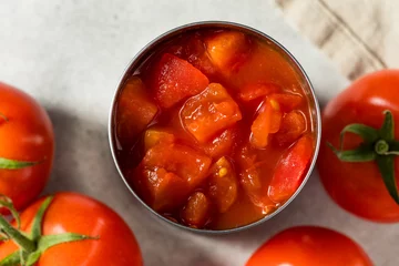 Plexiglas foto achterwand Raw Organic Diced Canned Tomatoes © Brent Hofacker