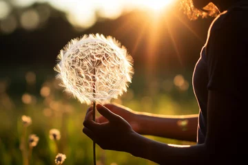 Foto op Plexiglas woman man with Enchanting display of glistening dew drops delicately adorning ethereal dandelion seeds, unveiling enchanting beauty and captivating charm of this humble flower in gentle embrace of mor © Andreww