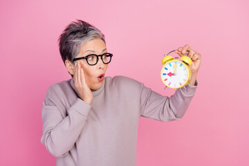 Portrait of stressed depressed woman wear stylish clothes hold clock omg time to work isolated on...