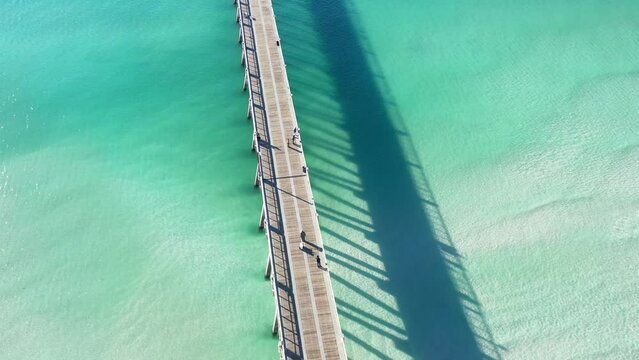 The Navarre Beach Fishing Pier is a record-holding fishing pier in Navarre, Florida. At 1, 545 feet long, the pier is the longest of its kind in the state. 
