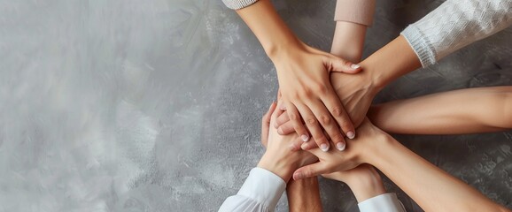 business people's hands together on a grey background, in a top view. A teamwork concept banner with copy space area for your text or logo, AI  - obrazy, fototapety, plakaty