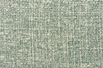Macro closeup of green and blue tweet fabric texture