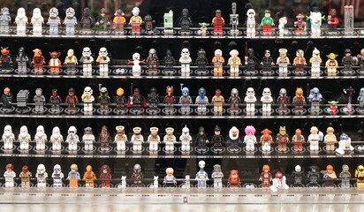 Fototapeta premium The collection of LEGO Star Wars figures in the LEGO museum in Krakow. luke skywalker, princess leia, han solo, chewbacca, darth vader, emperor palpatine, obi-wan kenobi, yoda, r2-d2, c-3po, boba fett