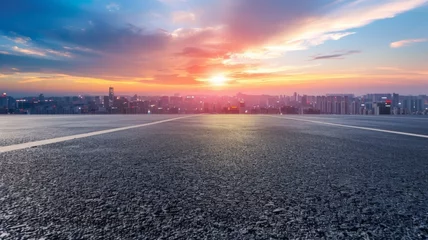 Foto auf Alu-Dibond Empty asphalt road and modern city skyline with building scenery at sunset. high angle view - generative ai © Nia™