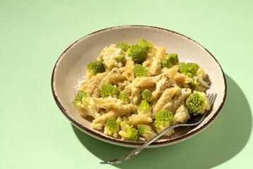 Roman cauliflower, Broccolo Romanesco, Romanesque cauliflower penne pasta with cauliflower cream. A...