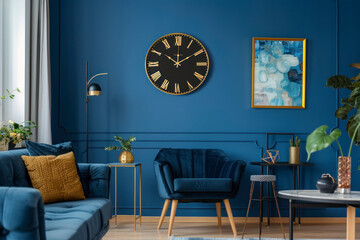 Golden wall clock in a blue living room interior with paintings and modern furniture.