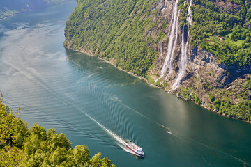 Seven Sisters waterfall in the beautiful Geiranger Fjord, a well known travel destination for...