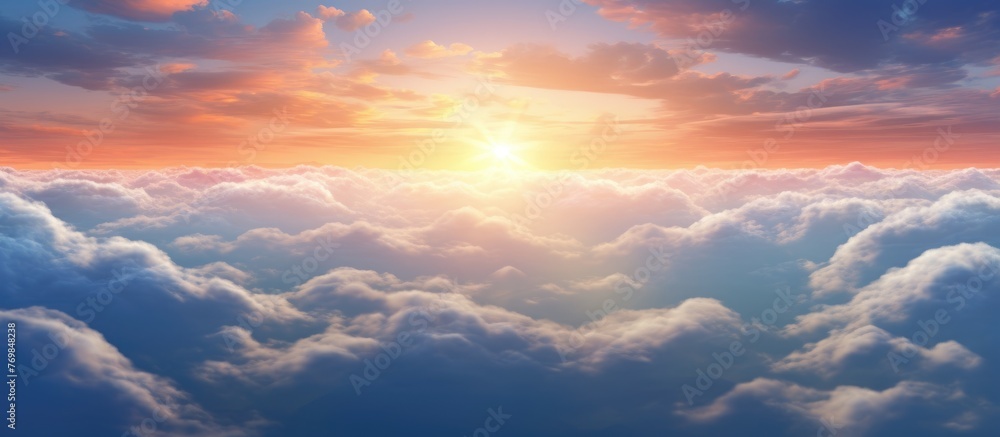 Poster the suns rays are peeking through the cumulus clouds in the sky, creating a beautiful afterglow in t