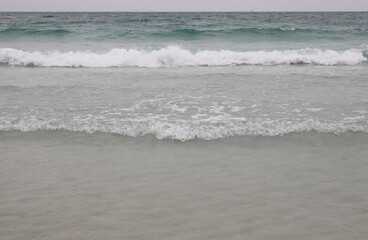 Ocean wave on a tropical beach