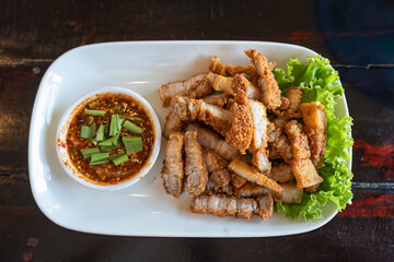 Fried pork belly with fish sauce and spicy dipping sauce
