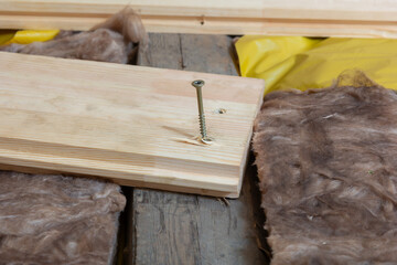 Creating a new wooden plank floor. House renovation